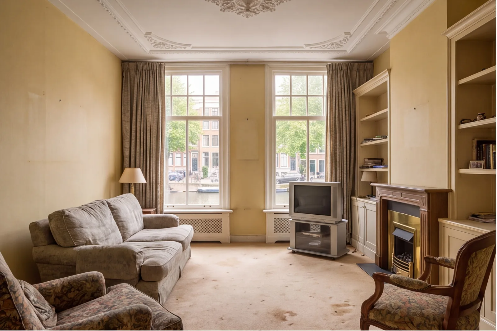 Before concept: Living room with two tall sash windows and fireplace